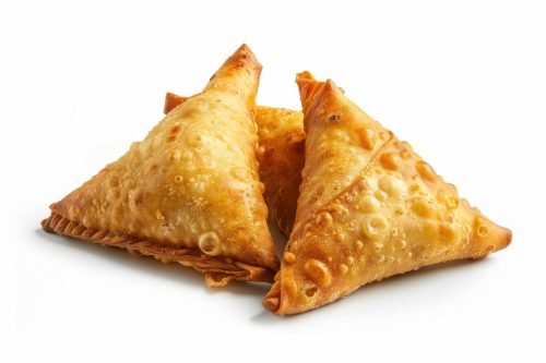 vecteezy_two-crispy-golden-fried-samosas-on-white-background_48748844